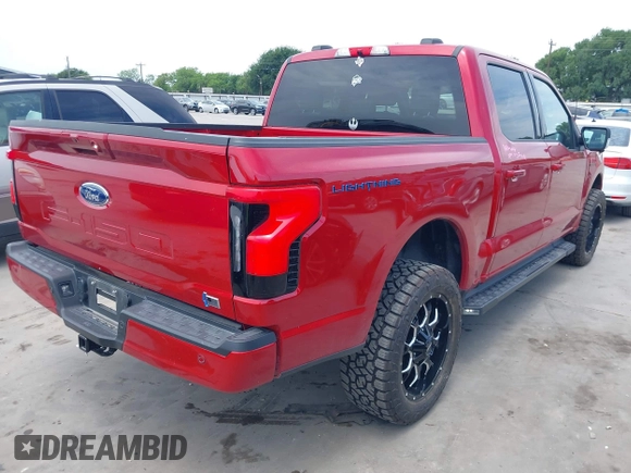 2023 Ford F-150 Lightning Pro with VIN 1FTVW1EL8PWG33656, listed as a IAAI auction lot 42260659 with 22,490 mi miles and . Bid and sale history available at DreamBid. Image 4.