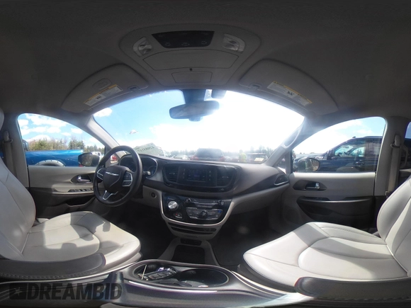 2017 Chrysler Pacifica Touring L with VIN 2C4RC1BGXHR667397, listed as a IAAI auction lot 42085117 with 63,996 mi miles and . Bid and sale history available at DreamBid. Image 20.