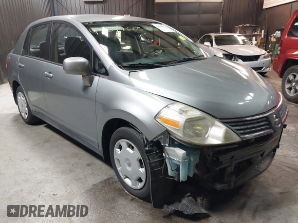 2009 Nissan Versa 1.8 S with VIN 3N1BC11EX9L396439, listed as a IAAI auction lot 42049665 with 49,617 mi miles. Bid and sale history available at carsss.com. Image 1.