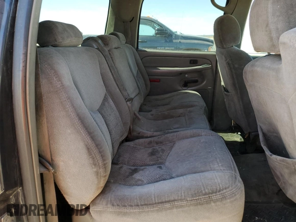 2004 Chevrolet Suburban LS z VIN 1GNEC16T34J317301, wystawiony jako Copart lot #57801655 z przebiegiem 269 929 mil mil oraz Czysty tytuł • Clean title. Historia ofert i sprzedaży dostępna na DreamBid. Obrazek 11.