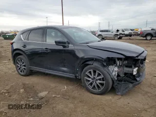 2017 Mazda CX-5 Grand Touring with VIN JM3KFBDL8H0102060, listed as a Copart auction lot 50938325 with 71,868 mi miles and Clean Title. Bid and sale history available at carsss.com. Image 4.