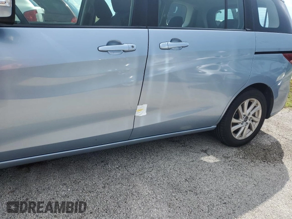 2013 Mazda 5 Sport with VIN JM1CW2BL0D0145429, listed as a Copart auction lot 74133644 with 70,161 mi miles and Salvage Title. Bid and sale history available at DreamBid. Image 12.