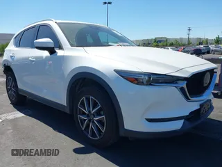2018 Mazda CX-5 Grand Touring with VIN JM3KFADM0J1359071, listed as a IAAI auction lot 42624530 with 60,402 mi miles and . Bid and sale history available at DreamBid. Image 1.