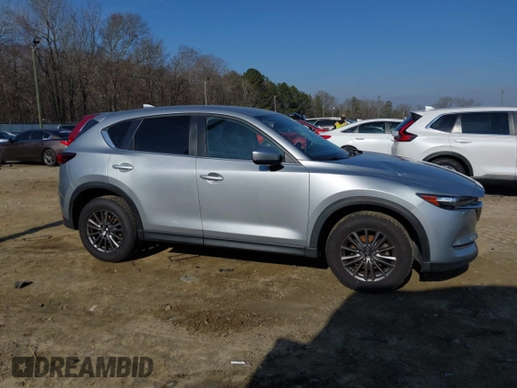 2020 Mazda CX-5 Touring with VIN JM3KFACM8L0727393, listed as a IAAI auction lot 41492627 with 91,521 mi miles. Bid and sale history available at carsss.com. Image 13.