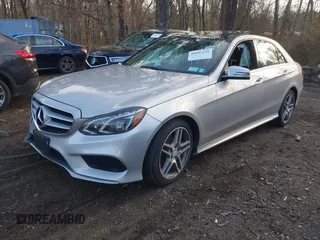 2014 Mercedes-Benz E 350 Luxury with VIN WDDHF8JB2EB043563, listed as a IAAI auction lot 41887276 with 73,003 mi miles and . Bid and sale history available at DreamBid. Image 2.