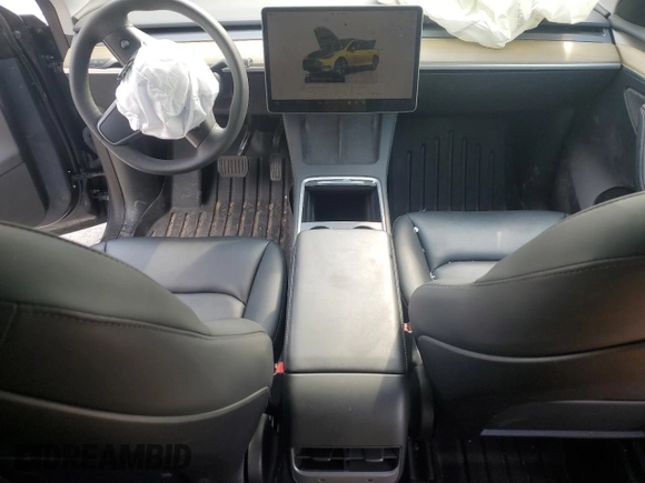 2023 Tesla Model Y Long Range z VIN 7SAYGDEE2PA041350, wystawiony jako Copart lot #56657005 z przebiegiem 25 090 mil mil oraz Szkoda całkowita • Salvage title. Historia ofert i sprzedaży dostępna na DreamBid. Obrazek 8.