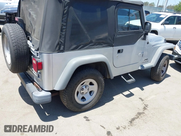 2004 Jeep Wrangler SE with VIN 1J4FA29134P715165, listed as a IAAI auction lot 42297821 with 109,397 mi miles and . Bid and sale history available at DreamBid. Image 4.