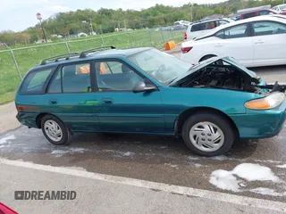 1997 Ford Escort LX with VIN 3FALP15P1VR169817, listed as a IAAI auction lot 42094673 with 111,762 mi miles. Bid and sale history available at carsss.com. Image 13.