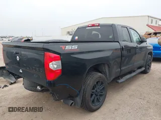 2019 Toyota Tundra SR with VIN 5TFRM5F1XKX143105, listed as a IAAI auction lot 41274567 with 180,602 mi miles and . Bid and sale history available at DreamBid. Image 4.