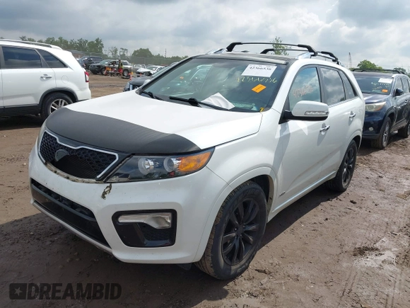 2012 Kia Sorento SX z VIN 5XYKWDA23CG231228, wystawiony jako IAAI lot #42366536 z przebiegiem 154 627 mil mil oraz . Historia ofert i sprzedaży dostępna na DreamBid. Obrazek 17.