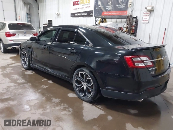 2015 Ford Taurus SHO with VIN 1FAHP2KT6FG137418, listed as a IAAI auction lot 42256452 with 140,335 mi miles and . Bid and sale history available at DreamBid. Image 3.