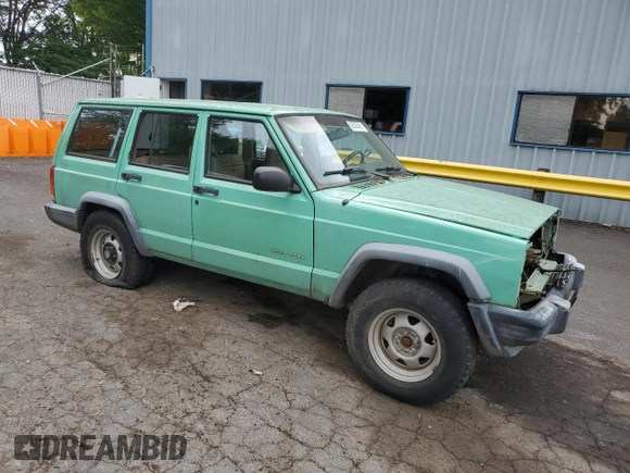 1999 Jeep Cherokee SE with VIN 1J4FF28SXXL641556, listed as a Copart auction lot 62605065 with Not provided miles and Salvage title. Bid and sale history available at DreamBid. Image 4.