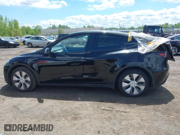 2023 Tesla Model Y Long Range with VIN 7SAYGDEE0PA183891, listed as a IAAI auction lot 42205573 with 41,273 mi miles and . Bid and sale history available at DreamBid. Image 14.