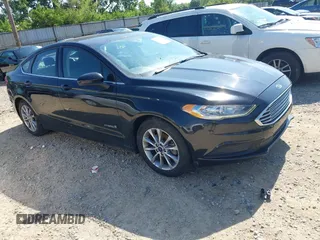 2017 Ford Fusion Hybrid SE with VIN 3FA6P0LU7HR387944, listed as a IAAI auction lot 42643372 with 122,289 mi miles and . Bid and sale history available at DreamBid. Image 1.