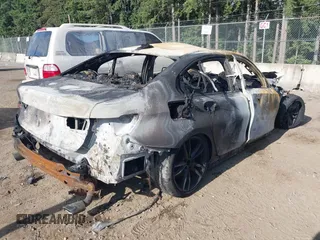 2021 BMW 3 Series 330i с VIN 3MW5R1J04M8C05815, выставлен на аукционе IAAI как лот 42542424 с пробегом Не указан миль и . История ставок и продаж доступна на DreamBid. Изображение 4.