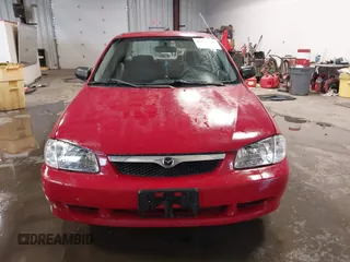 2000 Mazda Protege DX with VIN JM1BJ2220Y0258658, listed as a IAAI auction lot 41622579 with 276,682 mi miles and . Bid and sale history available at DreamBid. Image 13.