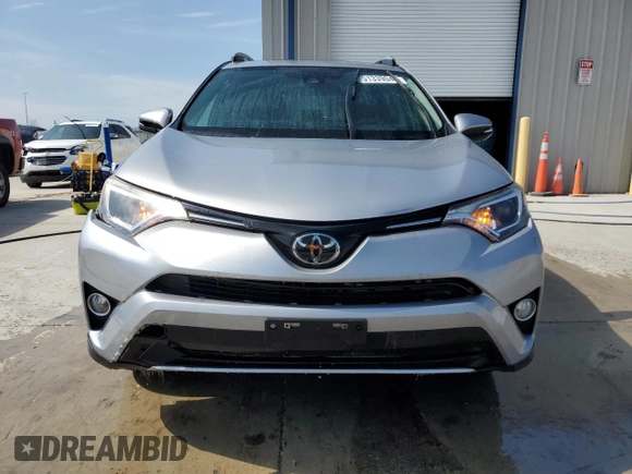 2018 Toyota RAV4 XLE with VIN 2T3RFREV3JW740122, listed as a Copart auction lot 51339045 with 115,293 mi miles and Salvage Title. Bid and sale history available at DreamBid. Image 5.