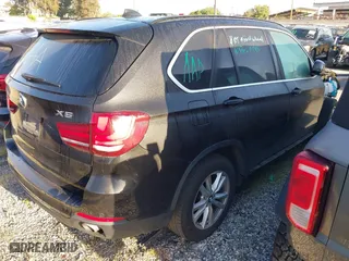 2015 BMW X5 sDrive35i with VIN 5UXKR2C54F0H35124, listed as a IAAI auction lot 41885474 with 88,865 mi miles. Bid and sale history available at carsss.com. Image 4.