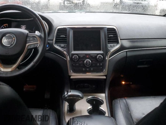 2014 Jeep Grand Cherokee Limited with VIN 1C4RJEBT5EC147459, listed as a Copart auction lot 87828735 with 213,960 mi miles and Clean Title. Bid and sale history available at DreamBid. Image 8.