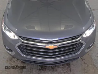 2021 Chevrolet Traverse LT Cloth z VIN 1GNEVGKW8MJ192048, wystawiony jako IAAI lot #42556137 z przebiegiem 106 304 mil mil oraz . Historia ofert i sprzedaży dostępna na DreamBid. Obrazek 8.