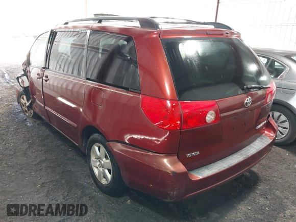 2009 Toyota Sienna CE with VIN 5TDZK23C89S265150, listed as a IAAI auction lot 42079867 with 211,467 mi miles. Bid and sale history available at carsss.com. Image 3.
