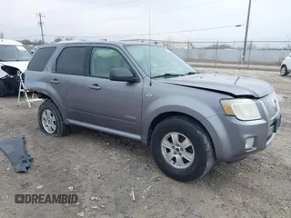 2008 Mercury Mariner with VIN 4M2CU91118KJ13477, listed as a IAAI auction lot 41987552 with 130,238 mi miles. Bid and sale history available at carsss.com. Image 1.