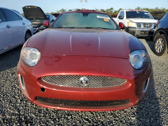 2010 Jaguar XK with VIN SAJWA4GB5ALB36814, listed as a Copart auction lot 74855444 with 0 mi miles and Salvage Title. Bid and sale history available at carsss.com. Image 5.