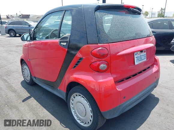 2014 Smart fortwo Pure z VIN WMEEJ3BAXEK744079, wystawiony jako IAAI lot #42421069 z przebiegiem 79 788 mil mil oraz . Historia ofert i sprzedaży dostępna na DreamBid. Obrazek 3.