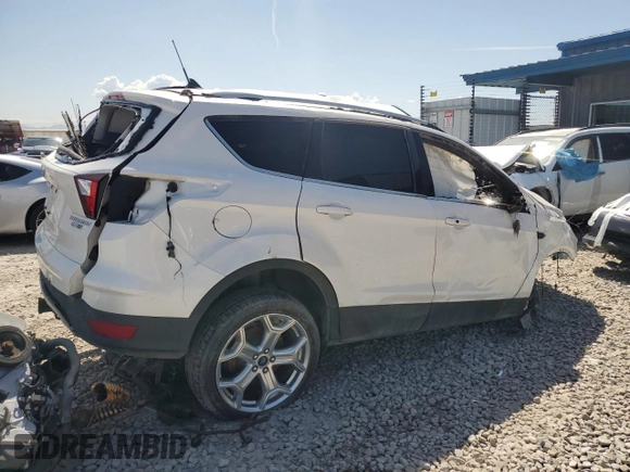 2019 Ford Escape Titanium с VIN 1FMCU9J93KUB60965, выставлен на аукционе Copart как лот 58363185 с пробегом Не указан миль и Списание • Salvage title. История ставок и продаж доступна на DreamBid. Изображение 3.
