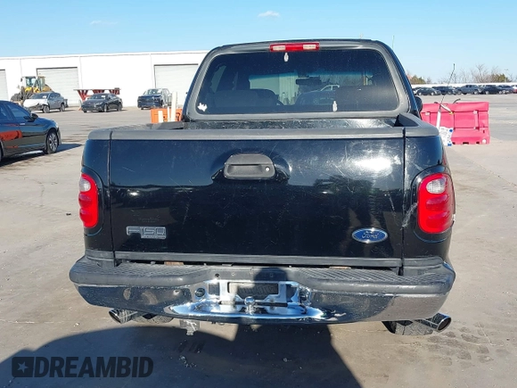 2002 Ford F-150 XLT with VIN 1FTRW07622KD31203, listed as a IAAI auction lot 41401506 with 166,949 mi miles. Bid and sale history available at carsss.com. Image 16.