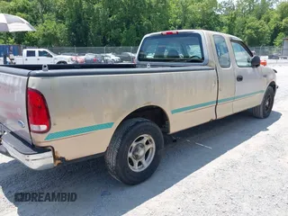 1997 Ford F-150 with VIN 1FTDX1721VNA45906, listed as a IAAI auction lot 42622491 with 153,314 mi miles and . Bid and sale history available at DreamBid. Image 4.