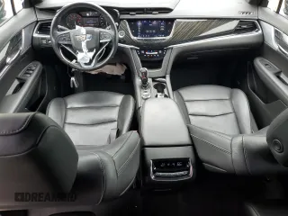 2020 Cadillac XT6 FWD Premium Luxury with VIN 1GYKPCRSXLZ154638, listed as a Copart auction lot 57439835 with 142,435 mi miles and Salvage title. Bid and sale history available at DreamBid. Image 8.