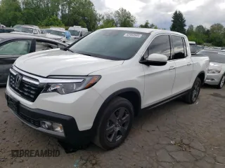 2020 Honda Ridgeline RTL-E with VIN 5FPYK3F74LB014841, listed as a Copart auction lot 62960585 with 43,558 mi miles and Salvage title. Bid and sale history available at DreamBid. Image 1.