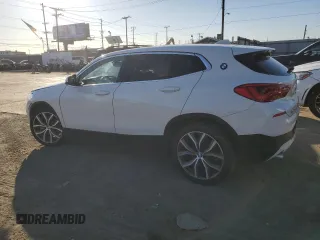 2020 BMW X2 xDrive28i with VIN WBXYJ1C02L5P85780, listed as a Copart auction lot 81761284 with 14,451 mi miles and Salvage Title. Bid and sale history available at carsss.com. Image 2.