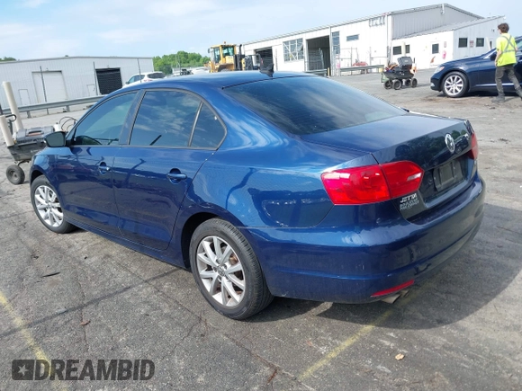 2012 Volkswagen Jetta SE with VIN 3VWDX7AJ1CM389470, listed as a IAAI auction lot 41011343 with 133,295 mi miles and . Bid and sale history available at DreamBid. Image 3.