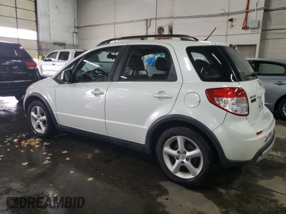 2007 Suzuki SX4 z VIN JS2YB413375101209, wystawiony jako Copart lot #87550235 z przebiegiem 167 788 mil mil oraz Szkoda całkowita • Salvage title. Historia ofert i sprzedaży dostępna na DreamBid. Obrazek 2.