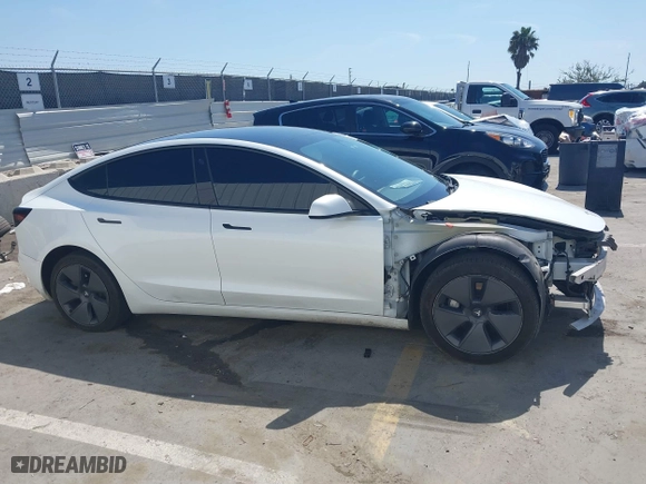 2023 Tesla Model 3 with VIN 5YJ3E1EA6PF405491, listed as a IAAI auction lot 41851797 with 47,581 mi miles. Bid and sale history available at carsss.com. Image 14.