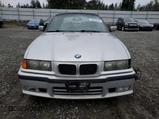 1999 BMW 3 Series 328ic with VIN WBABK7331XET68084, listed as a Copart auction lot 86205884 with 0 mi miles and Salvage Title. Bid and sale history available at carsss.com. Image 5.