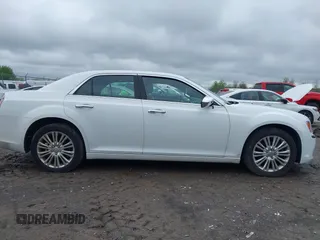 2014 Chrysler 300 C with VIN 2C3CCAKG5EH200996, listed as a IAAI auction lot 42201747 with 156,121 mi miles and . Bid and sale history available at carsss.com. Image 13.