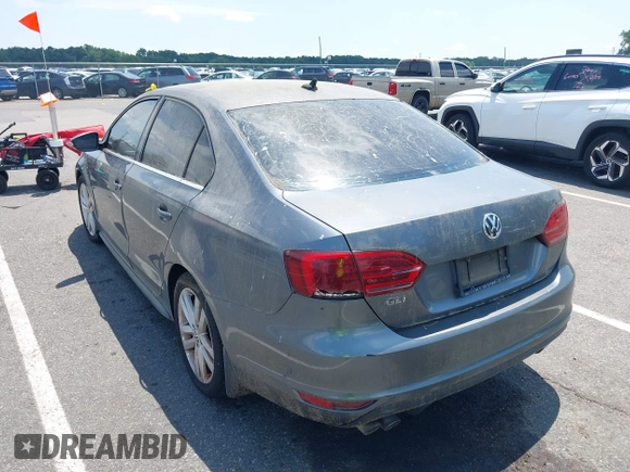 2014 Volkswagen Jetta GLI Autobahn with VIN 3VW5T7AJ6EM201416, listed as a IAAI auction lot 42684207 with 164,905 mi miles and . Bid and sale history available at DreamBid. Image 6.