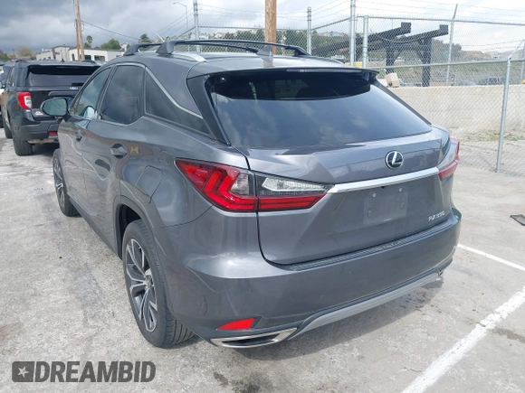 2020 Lexus RX with VIN 2T2HZMAA3LC153100, listed as a IAAI auction lot 41925188 with 104,216 mi miles. Bid and sale history available at carsss.com. Image 3.