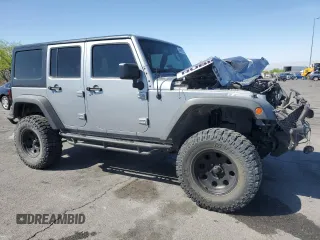 2014 Jeep Wrangler Unlimited Rubicon X with VIN 1C4BJWFG2EL308077, listed as a Copart auction lot 54439265 with 160,746 mi miles and Salvage title. Bid and sale history available at DreamBid. Image 4.