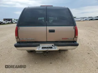 1995 GMC Suburban z VIN 1GKEC16K9SJ708907, wystawiony jako Copart lot #56415125 z przebiegiem 251 343 mil mil oraz Szkoda całkowita • Salvage title. Historia ofert i sprzedaży dostępna na DreamBid. Obrazek 6.