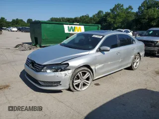 2014 Volkswagen Passat SE with VIN 1VWBT7A36EC100236, listed as a Copart auction lot 63279705 with 141,259 mi miles and Salvage title. Bid and sale history available at DreamBid. Image 1.