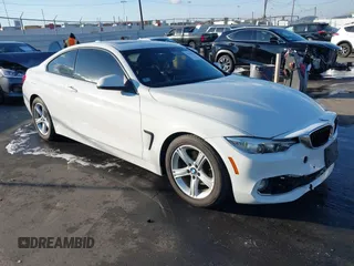 2014 BMW 4 Series 428i with VIN WBA3N7C50EF718812, listed as a IAAI auction lot 41349128 with 67,581 mi miles and . Bid and sale history available at carsss.com. Image 1.