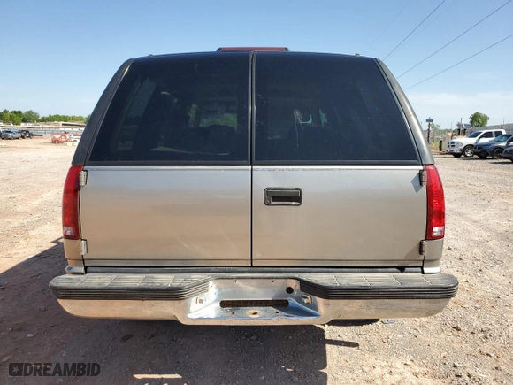 1999 Chevrolet Tahoe Limited with VIN 1GNEC13R5XR132083, listed as a Copart auction lot 54187405 with 167,548 mi miles and Clean Title. Bid and sale history available at carsss.com. Image 6.