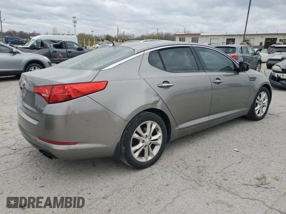2013 Kia Optima EX z VIN 5XXGN4A7XDG224691, wystawiony jako Copart lot #52872175 z przebiegiem 218 951 mil mil oraz Szkoda całkowita • Salvage title. Historia ofert i sprzedaży dostępna na DreamBid. Obrazek 3.