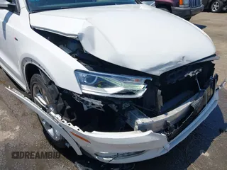 2018 Audi Q3 Premium with VIN WA1BCCFS4JR000455, listed as a IAAI auction lot 42042811 with 57,354 mi miles. Bid and sale history available at carsss.com. Image 6.