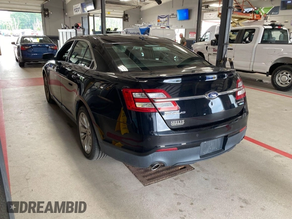 2018 Ford Taurus Limited with VIN 1FAHP2J80JG137940, listed as a IAAI auction lot 42843476 with 108,466 mi miles and . Bid and sale history available at DreamBid. Image 12.