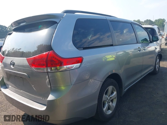 2013 Toyota Sienna LE AAS with VIN 5TDKK3DC2DS389557, listed as a IAAI auction lot 42589108 with 205,115 mi miles and . Bid and sale history available at DreamBid. Image 4.